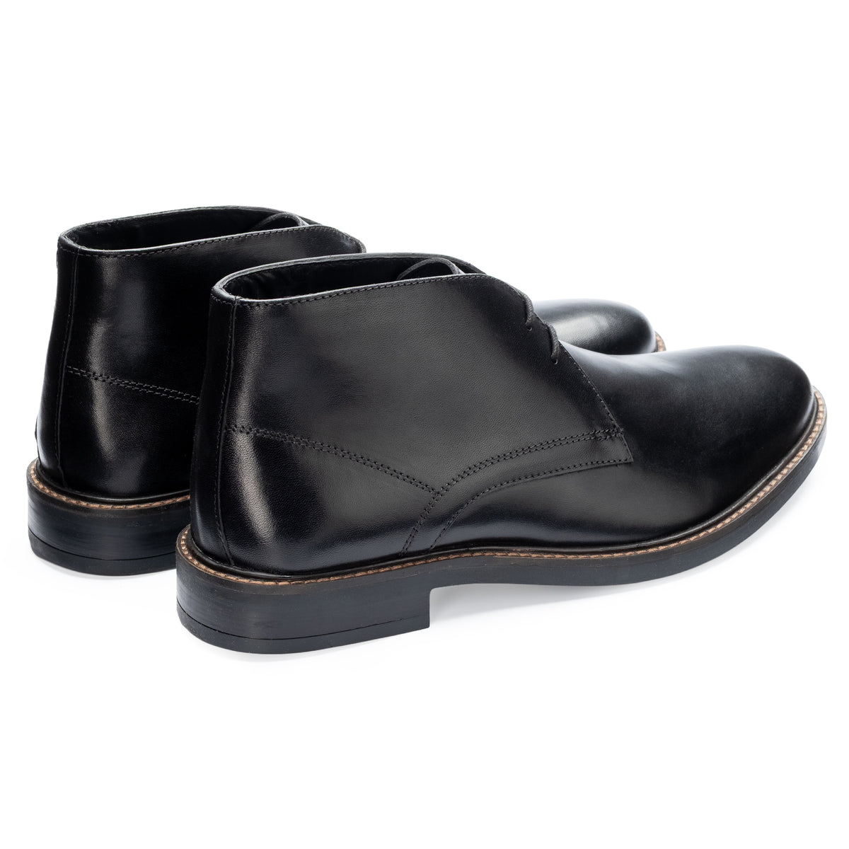 Oban Chukka Boot in Black, the pair shown from behind at three-quarter angle