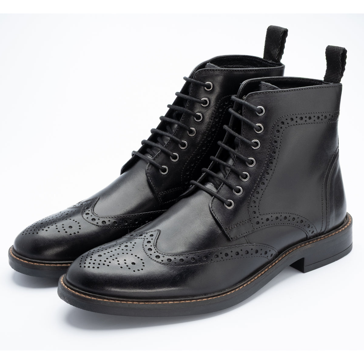 Aviemore Brogue Boot in Black, the pair shown from the front at three-quarter angle