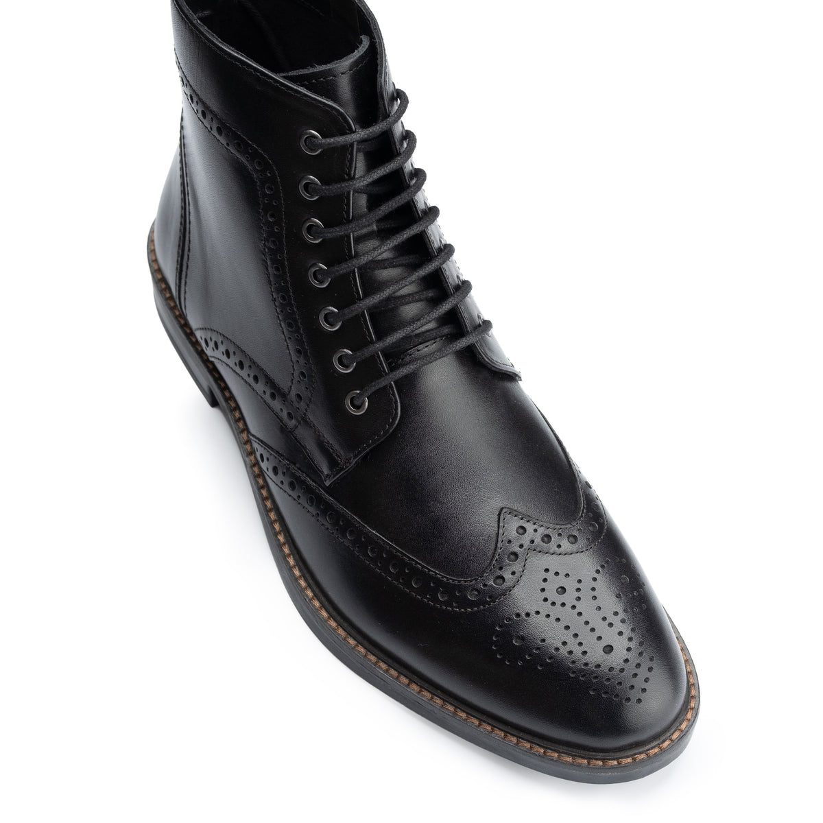 Aviemore Brogue Boot in Black, close detail of the toe and upper