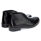 Oban Chukka Boot in Black, the pair shown from behind at three-quarter angle